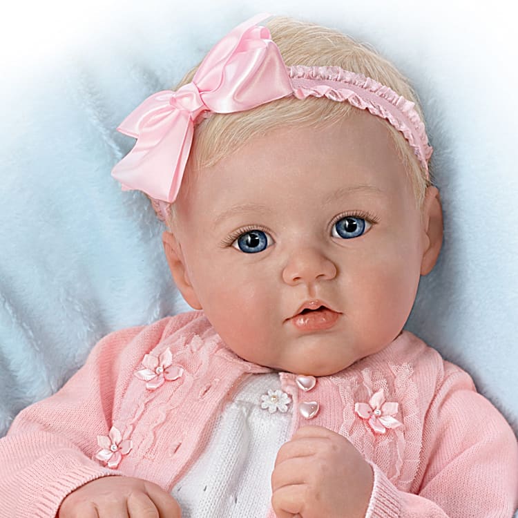 Baby girl with doll discount
