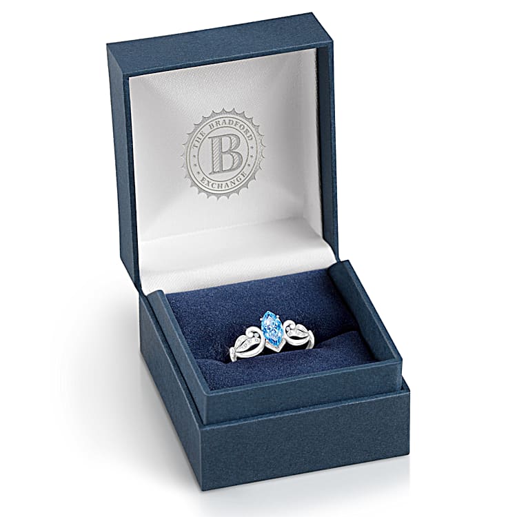 Sea Of Love Womens Sterling Silver Ring Featuring A Marquise Shaped Swiss Blue Topaz Centre Stone And Adorned With A Pave Of 20 Diamonds