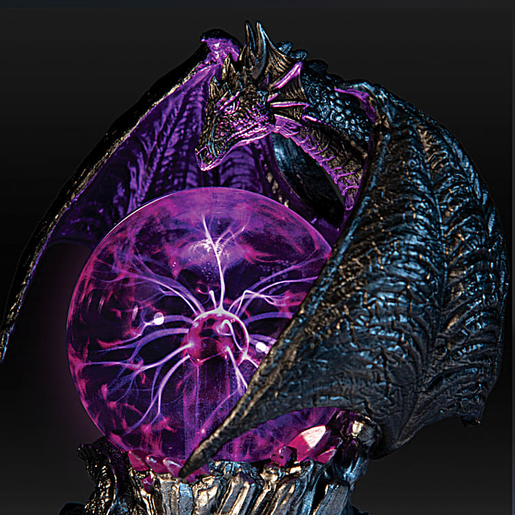 Dragon Sculptures Adorned With Illuminated Plasma Balls That Are